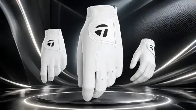 TaylorMade Tour Preferred Golf Glove displayed on a black background, showcasing its premium design and quality.