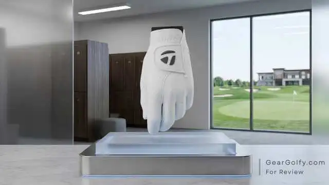 TaylorMade Tour Preferred perforated Cabretta leather glove positioned on a display stand.